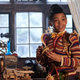 Journey (Madalen Mills) checks out her grandpa’s workshop.
